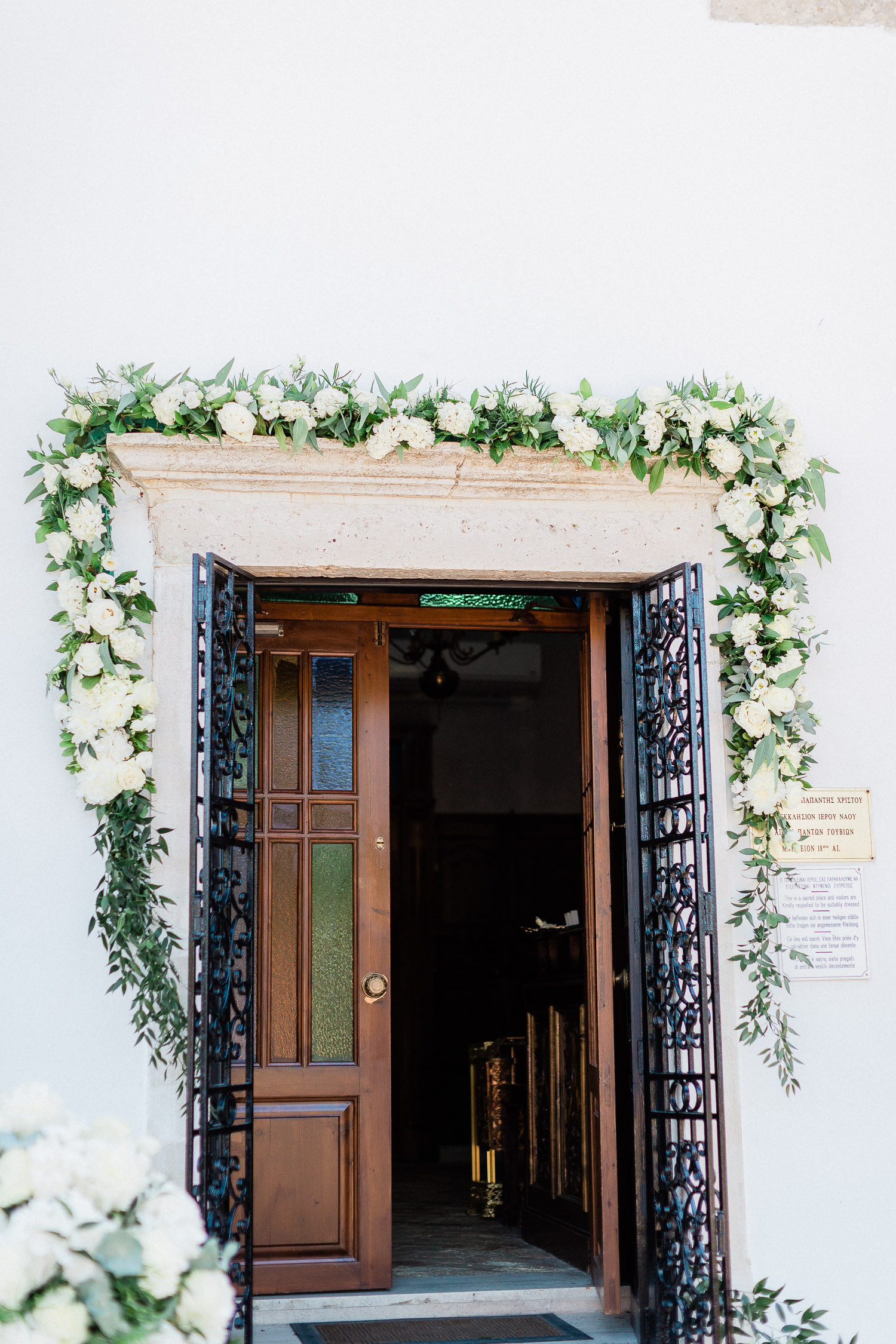 amazing church floral instalation at a July wedding in Corfu