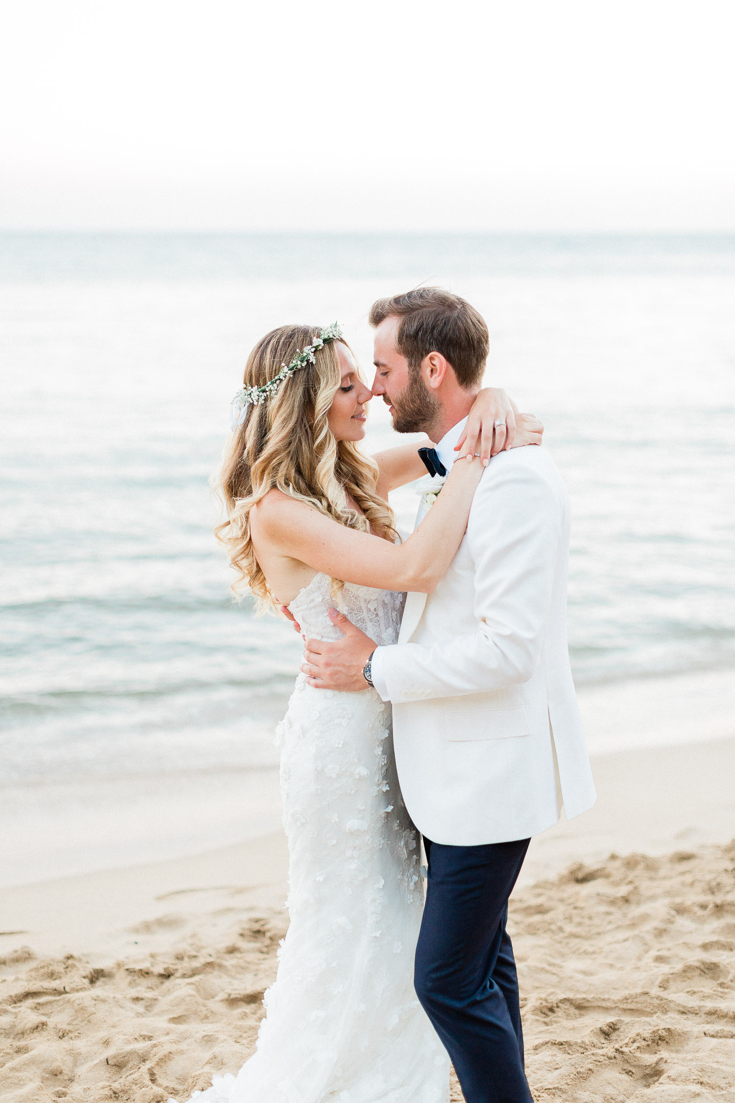 sweet moment of newlyweds on Corfu beach