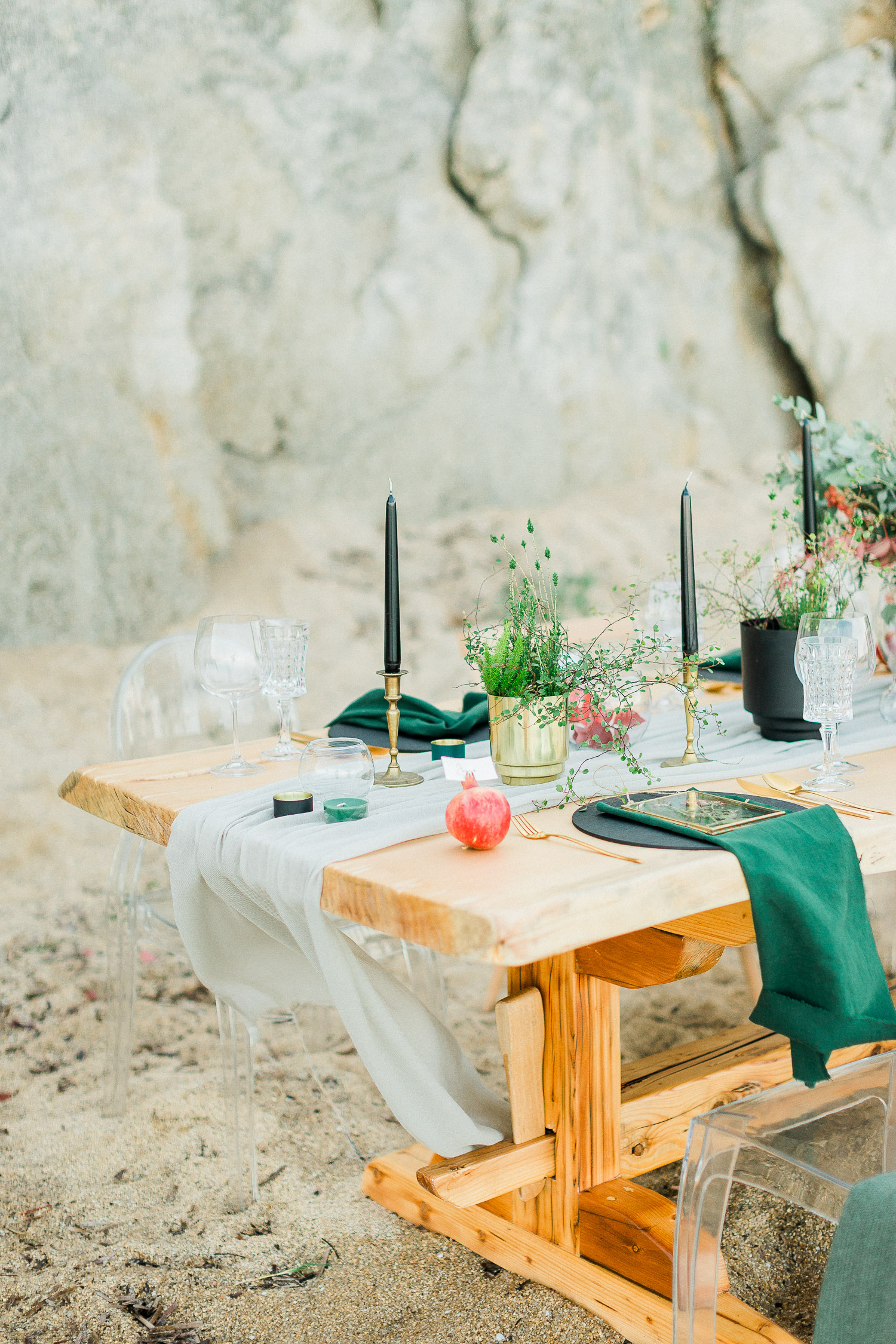 table set up on a rocky beach in Halkidiki, Greece